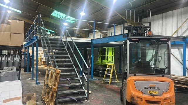 Forklift installation of chemical storage container at Midland Oil Group West Midlands facility