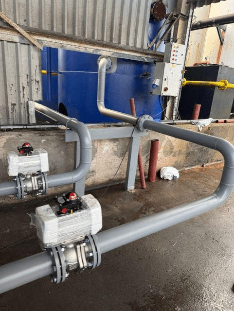 Industrial pipework junction for engine oil blending facility at Midland Oil Group West Midlands